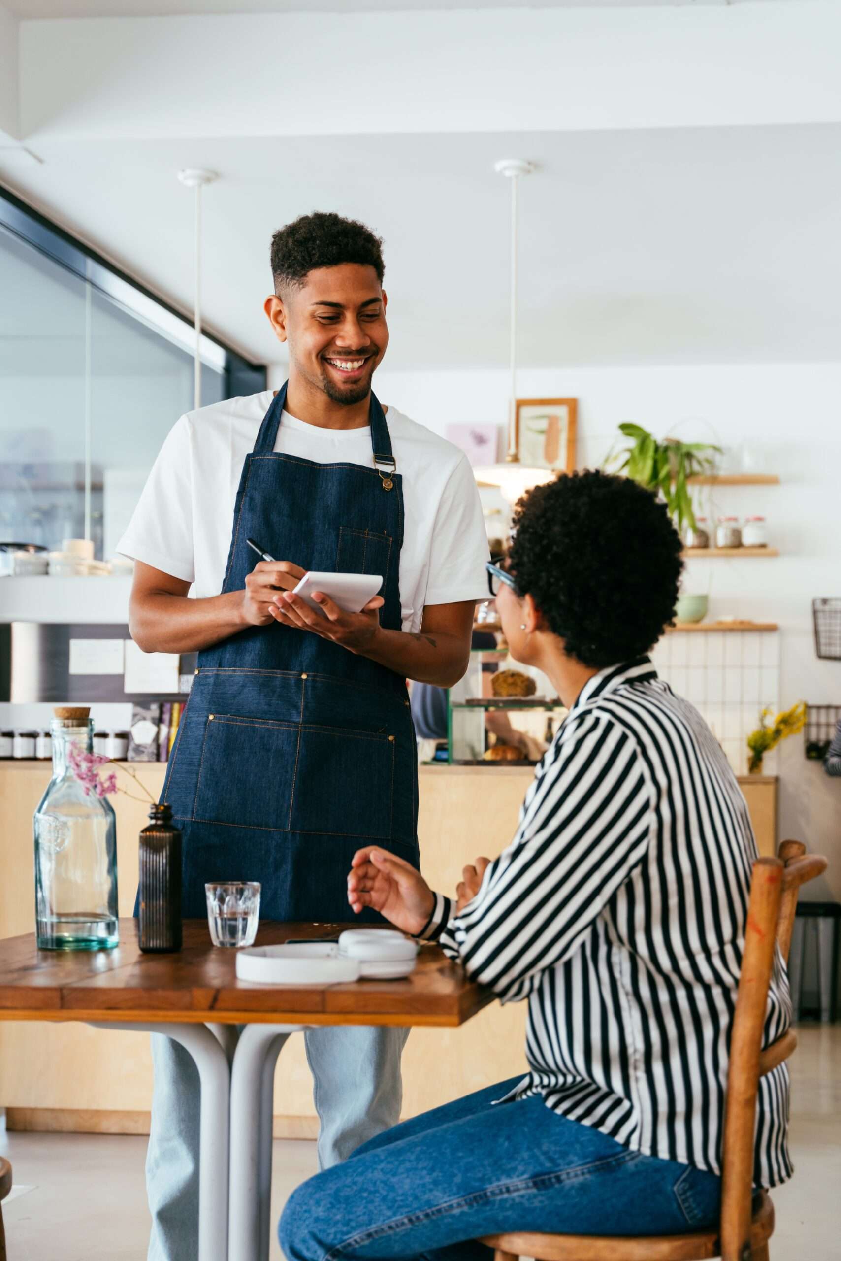 Youth gaining restaurant job experience through hands-on employment readiness program